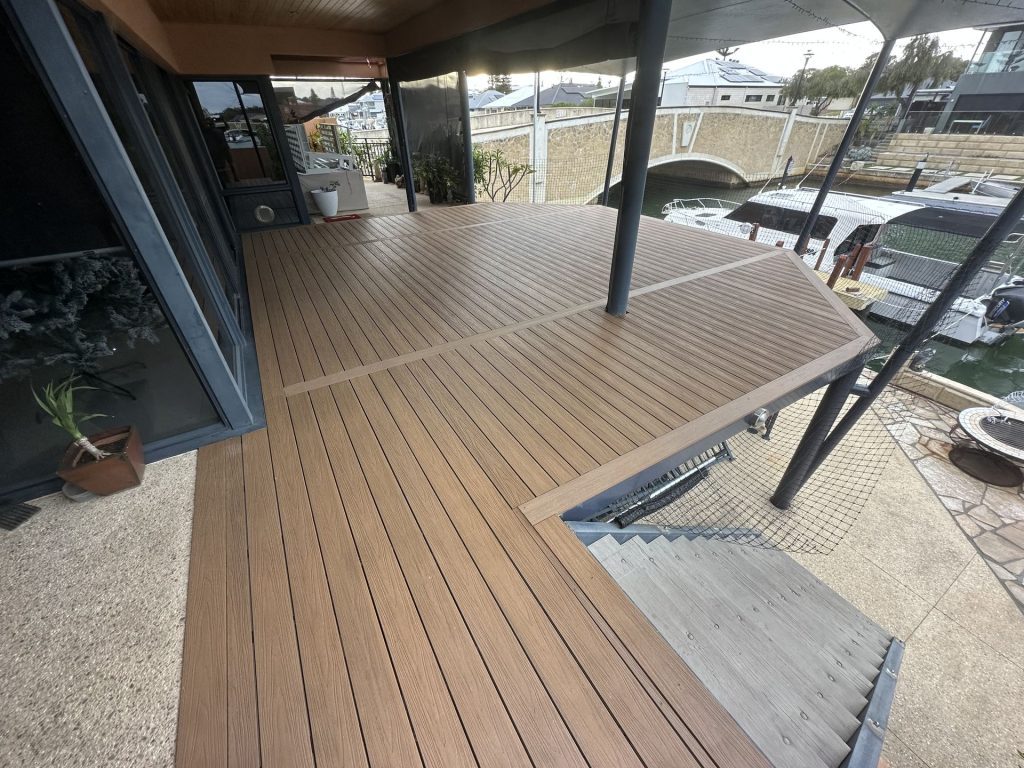 Angled composite deck with a mitred fascia above canal stairs in Mandurah