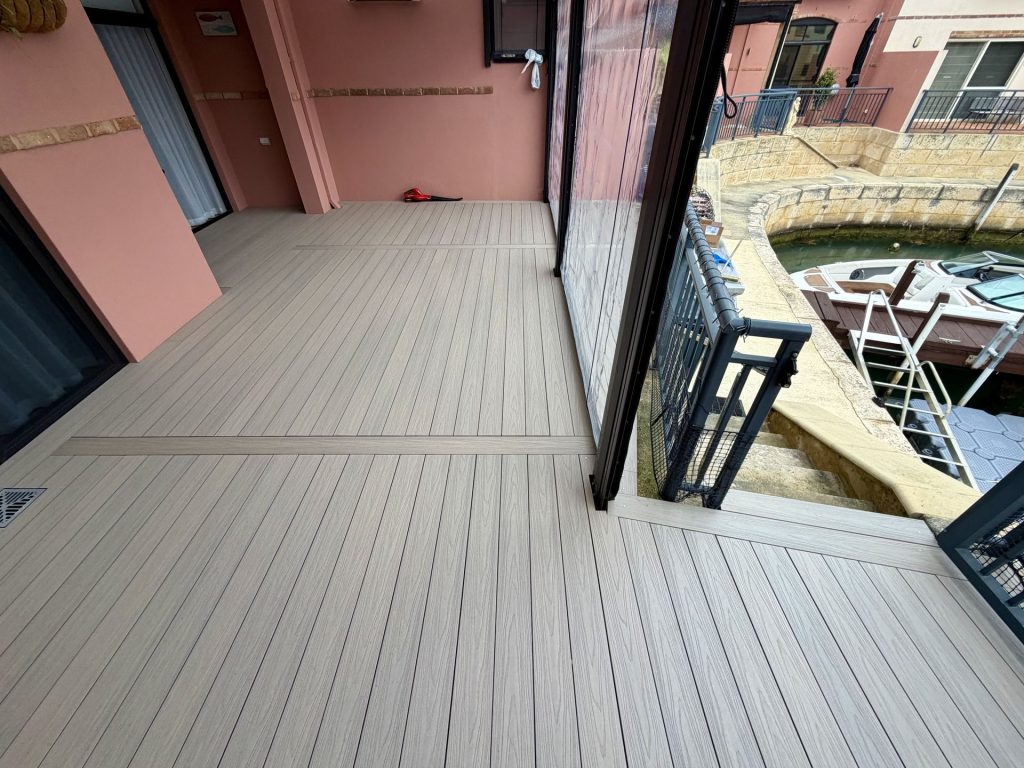 Composite deck with breaker boards beside a boat jetty at a Mandurah canal home