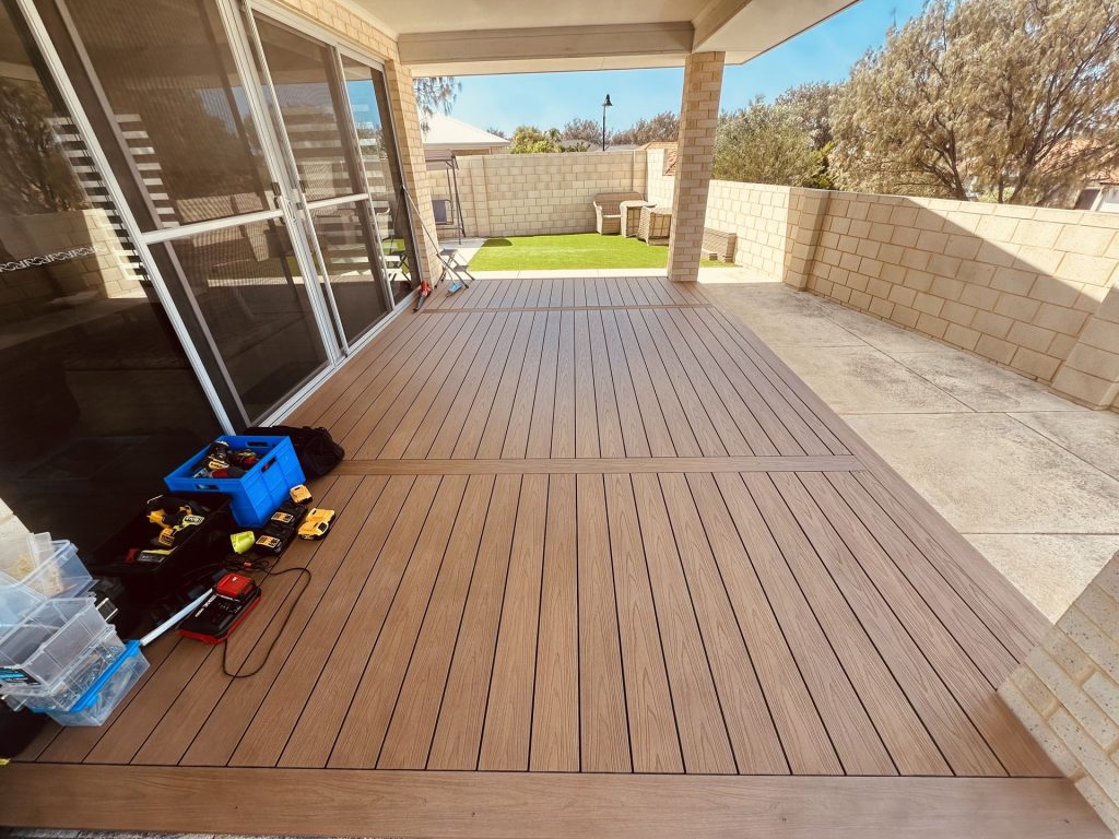 Light oak composite alfresco deck with a breaker board in Mandurah