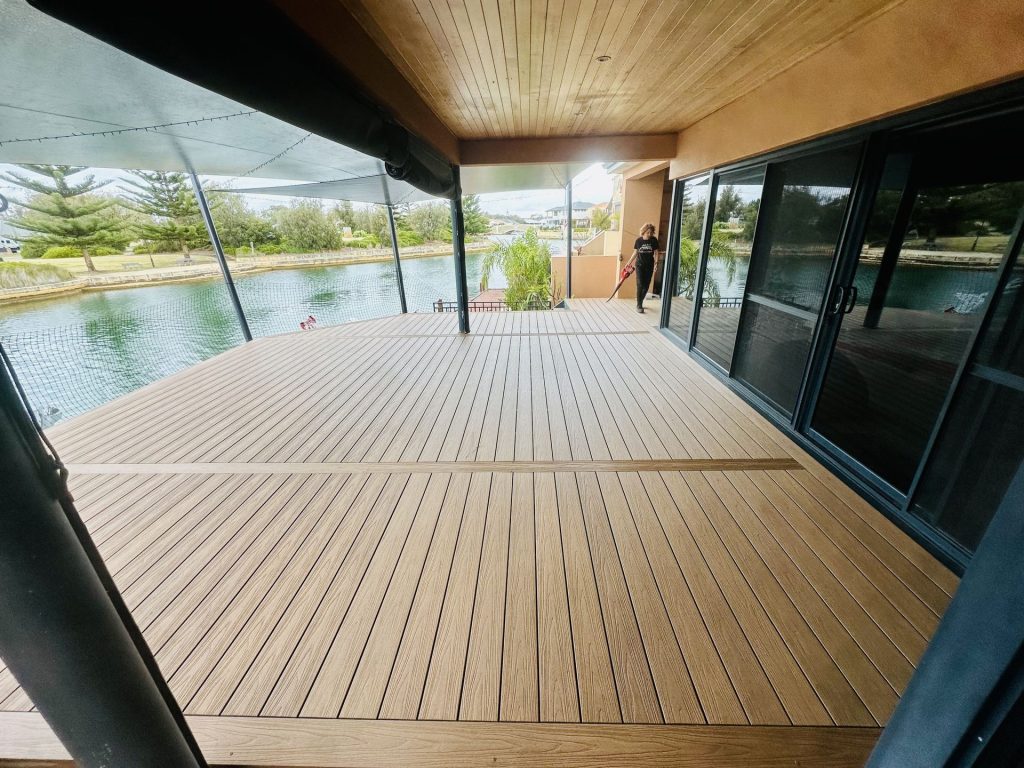 Teak-tone composite deck on a canal-front alfresco in Mandurah